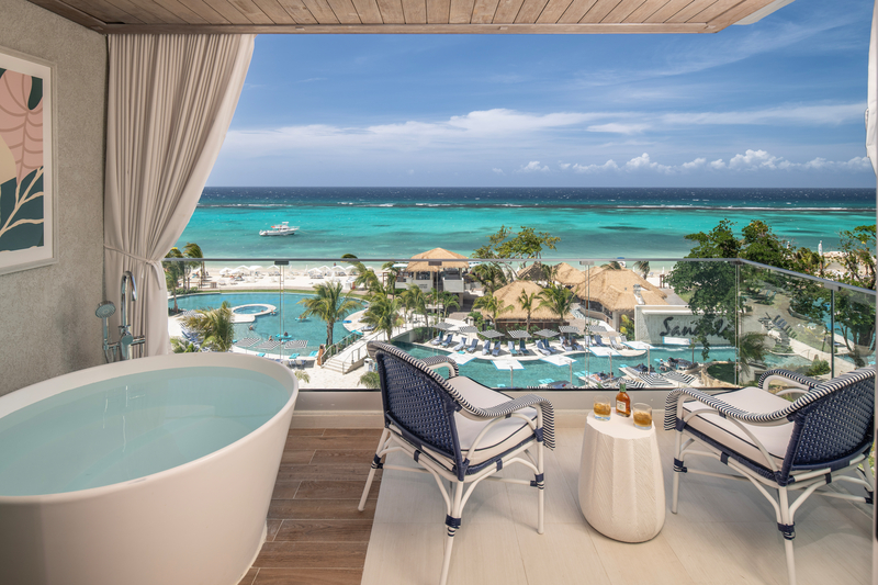 Turquoise Caribbean water and white sand beach